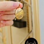 مدال بیضی نقش دار